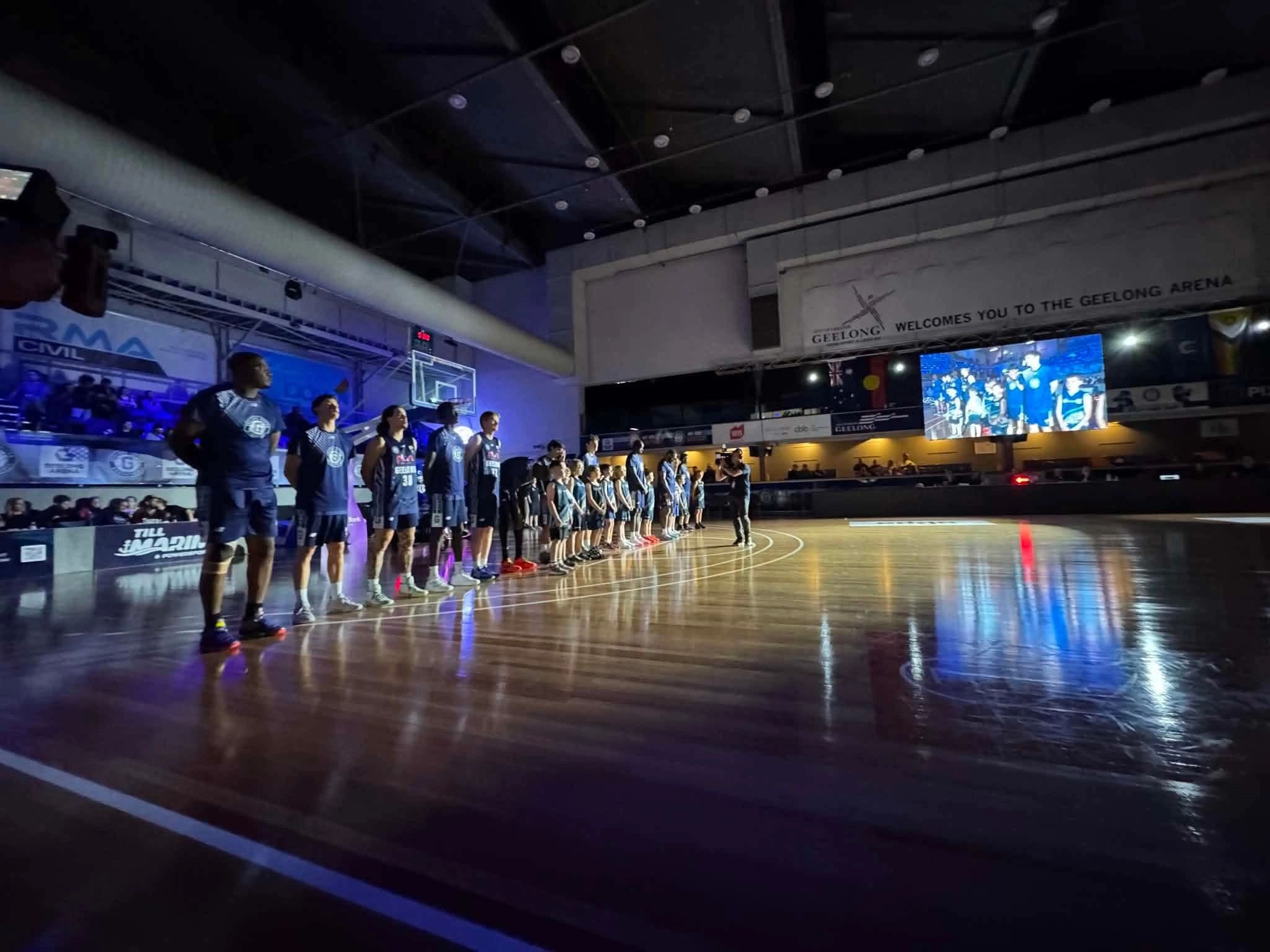 Players lined up under the lights at Geelong Arena before a game